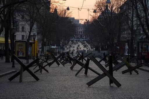 Anti- tank barricades are placed on a street as preparation for a possible Russian offensive, in Odesa, Ukraine, Thursday March 24, 2022.(AP Photo/Petros Giannakouris)