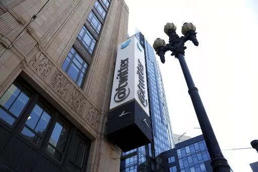 A sign is pictured outside the Twitter headquarters in San Francisco, Monday, April 25, 2022. Trading in shares of Twitter were halted, Tuesday, Oct. 4,  after the stock spiked on reports that Elon Musk would proceed with his $44 billion deal to buy the company after months of legal battles.(AP Photo/Jed Jacobsohn, File)