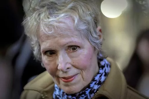 E. Jean Carroll talks to reporters outside a courthouse in New York, March 4, 2020. Federal Judge Lewis A. Kaplan issued an order Monday, April 10, 2023, directing parties to notify him if Trump plans to attend a New York trial later in the month resulting from Carroll's claims that he raped her in a department store dressing room in the 1990s. (AP Photo/Seth Wenig, File)