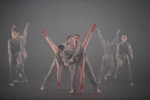 In this photo provided by New York City Center, dancers appear in "Twyla Tharp: In the Upper Room & Nine Sinatra Songs" at New York City Center on Oct. 19, 2022, in New York. (Christopher Duggan/New York City Center via AP)