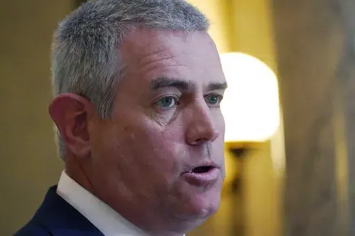 Speaker Philip Gunn, R-Clinton, presents to reporters the House's position on their state income tax elimination legislation at the Mississippi Capitol in Jackson, Tuesday, March 15, 2022. (AP Photo/Rogelio V. Solis)