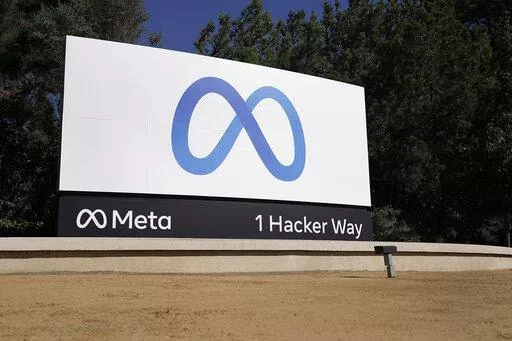 Facebook's Meta logo sign is seen at the company headquarters in Menlo Park, Calif., on, Oct. 28, 2021. A federal judge has ruled, Tuesday, Jan. 11, 2022, that the Federal Trade Commission’s revised antitrust suit against Meta, formerly known as Facebook, can proceed, shutting down the social media company’s request for a dismissal. (AP Photo/Tony Avelar, File)