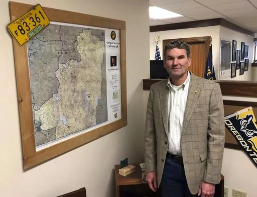 Oregon state Sen. Dennis Linthicum, R-Klamath Falls, poses in his office in the Oregon State Capitol in Salem, Ore., on Feb. 8, 2019. A federal judge on Wednesday, Dec. 13, 2023, rejected a request from Oregon Republican state senators who boycotted the Legislature to be allowed on the ballot after their terms end. State Sens. Dennis Linthicum, Brian Boquist and Cedric Hayden filed the federal lawsuit to challenge their disqualification from running for reelection under Measure 113. (AP Photo/An